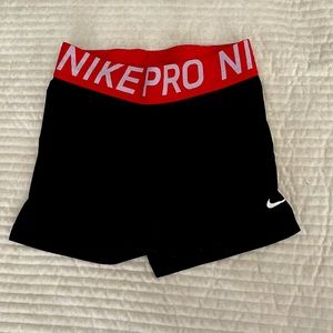 nike pro shorts with pink/red band